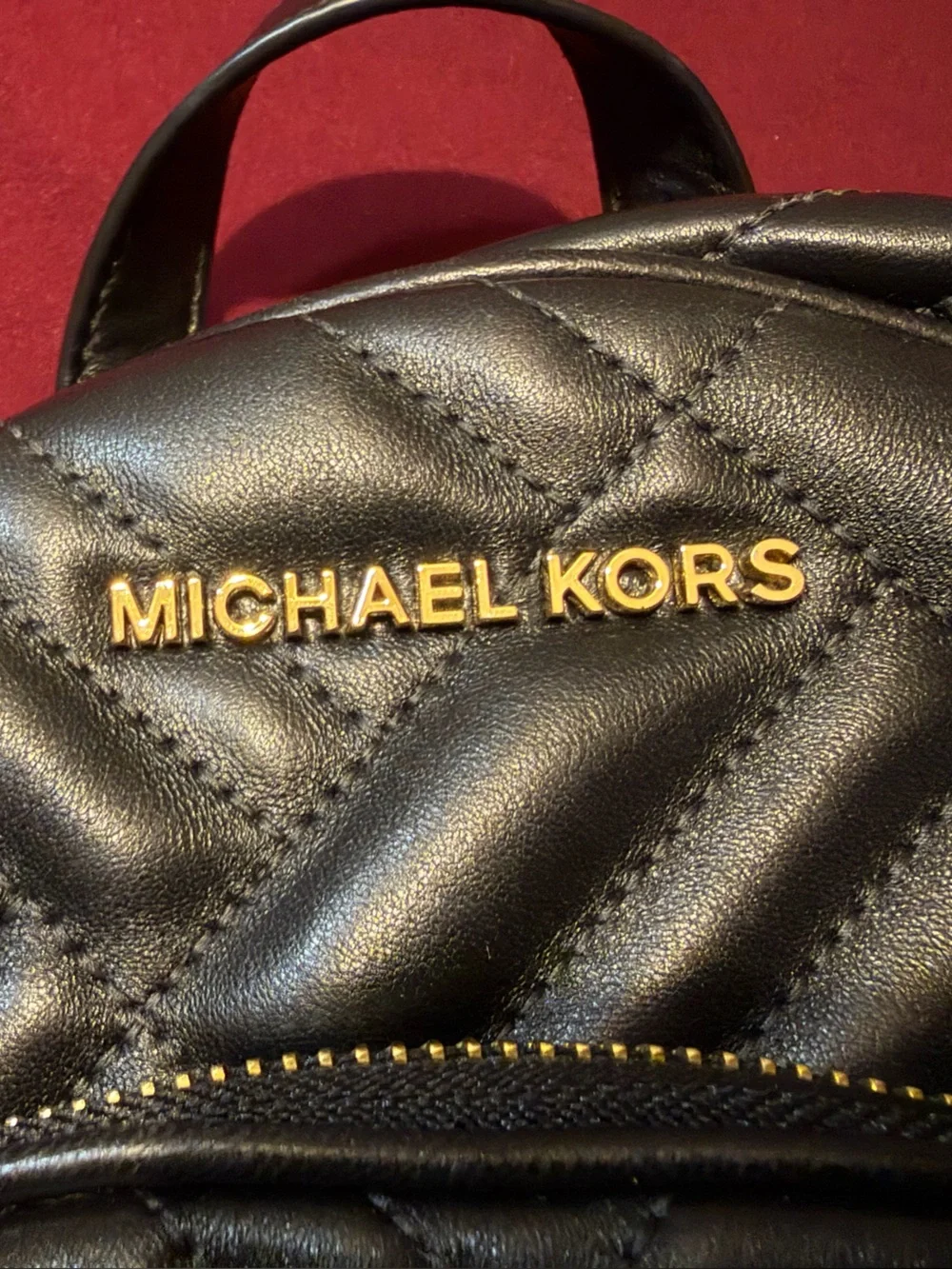 Michael Kors Black Quilted Leather Mini Backpack with Gold Hardware